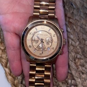 Michael Kor’s Gold Unisex/men’s watch